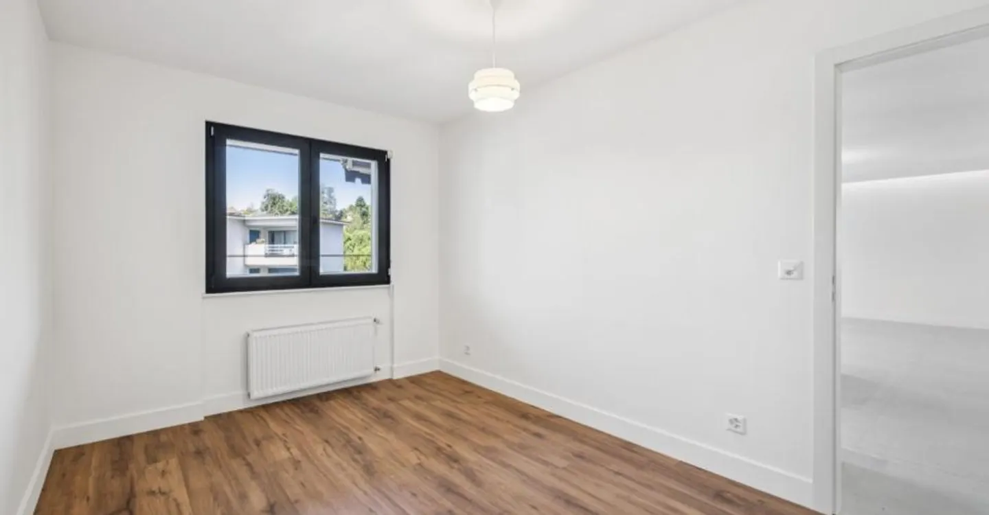 Appartement 3,5 pièces entièrement rénové - Un havre de paix avec vue - Photo 7 sur 9