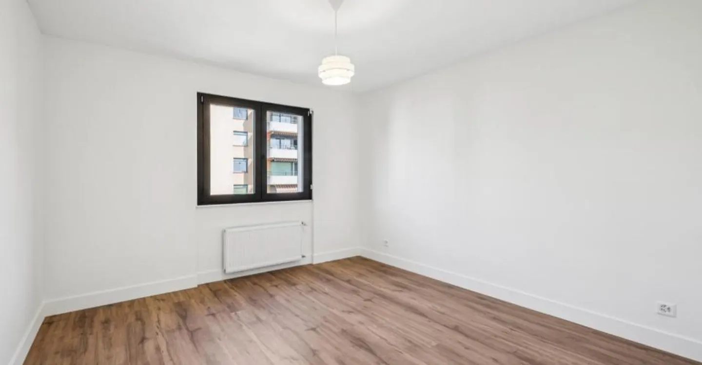 Appartement 3,5 pièces entièrement rénové - Un havre de paix avec vue - Photo 8 sur 9