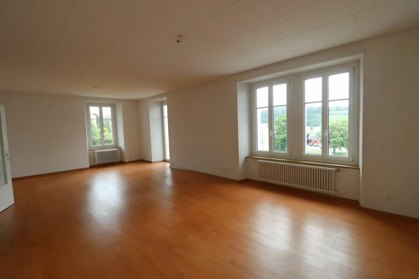Ertragsgebäude mit 9 Wohnungen, 1 Werkstatt und 8 Garagen - Foto 7 von 10