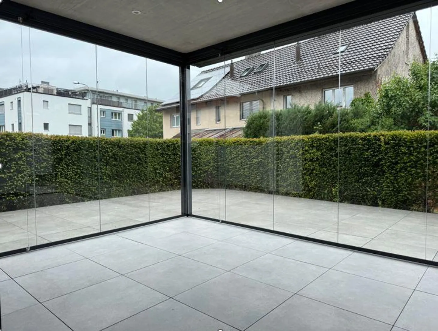 Moderne Gartenwohnung mit Wintergarten - Foto 3 von 7