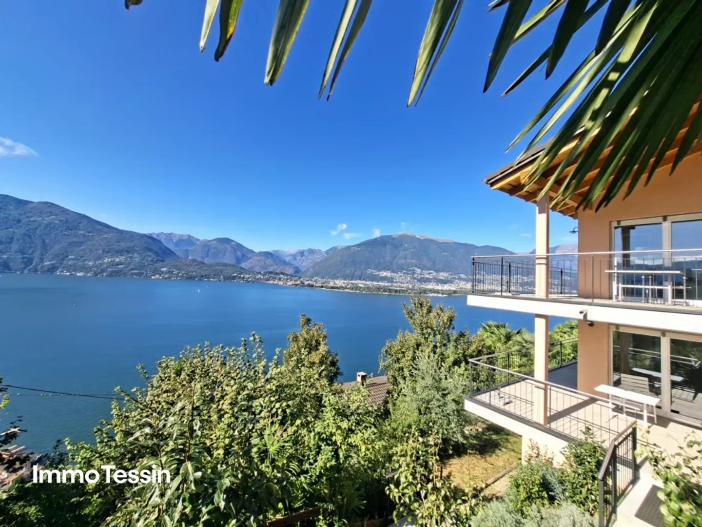 RARITY: Modern 5 1/2 Room Villa & Building Land with Unique Lake View of Lago Maggiore as far as the Eye Can See - Photo 1 of 13