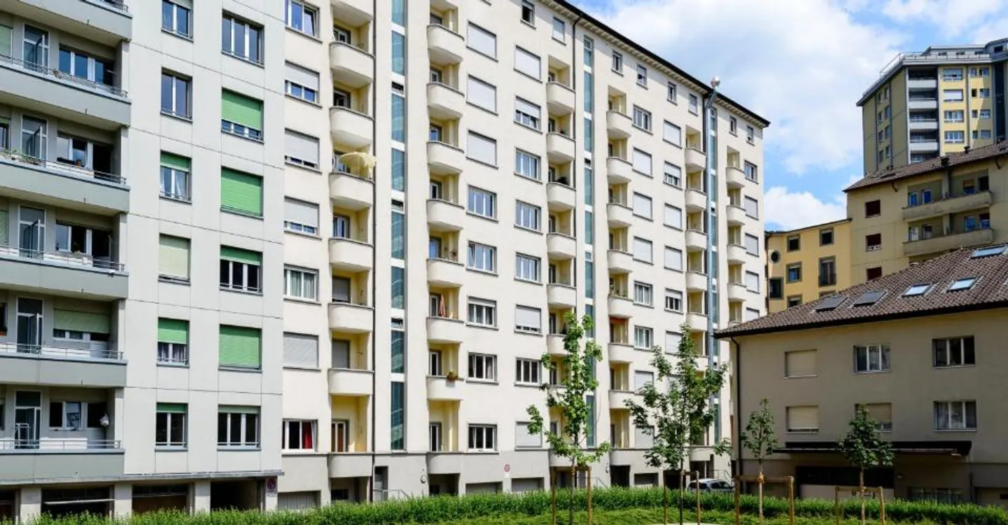 Indoor parking space for rent in Fribourg! - Photo 1 of 2