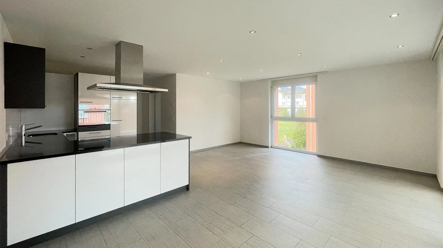Appartement 3.5 pièces avec espace de jardin et véranda - Photo 5 sur 11
