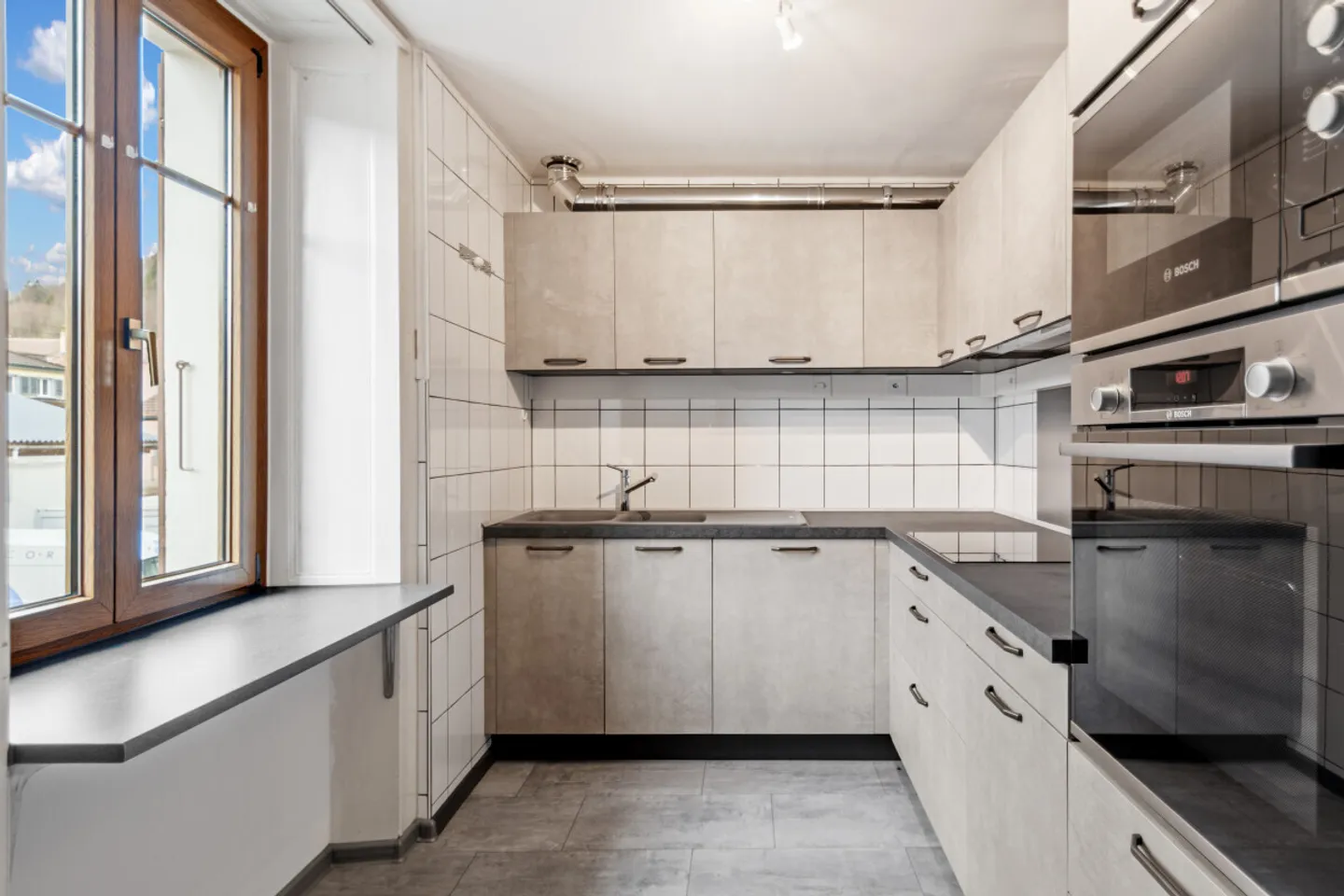 AUSGEZEICHNETE ERTRAGSGEBÄUDE FLEURIER ZENTRUM - Foto 3 von 13