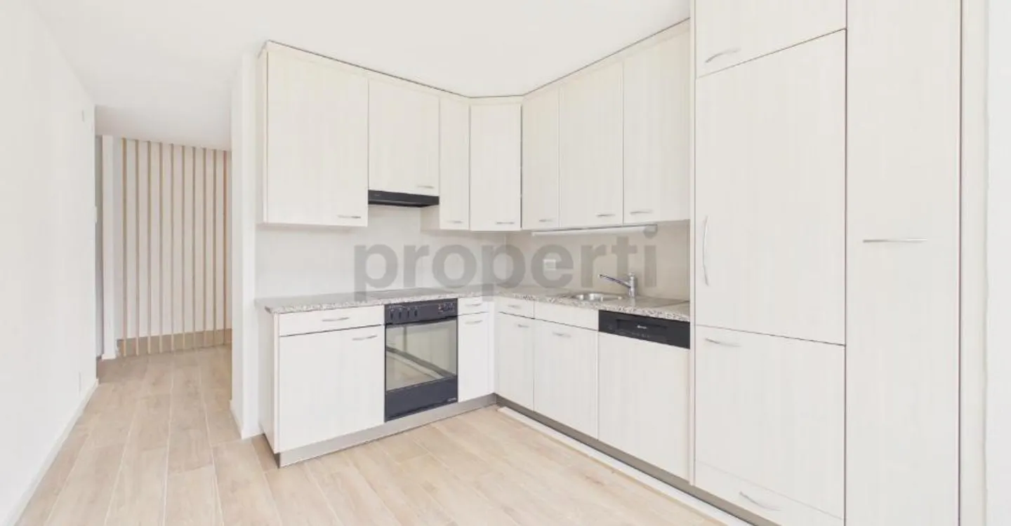 Appartement élégant 3.5 pièces - Photo 2 sur 9