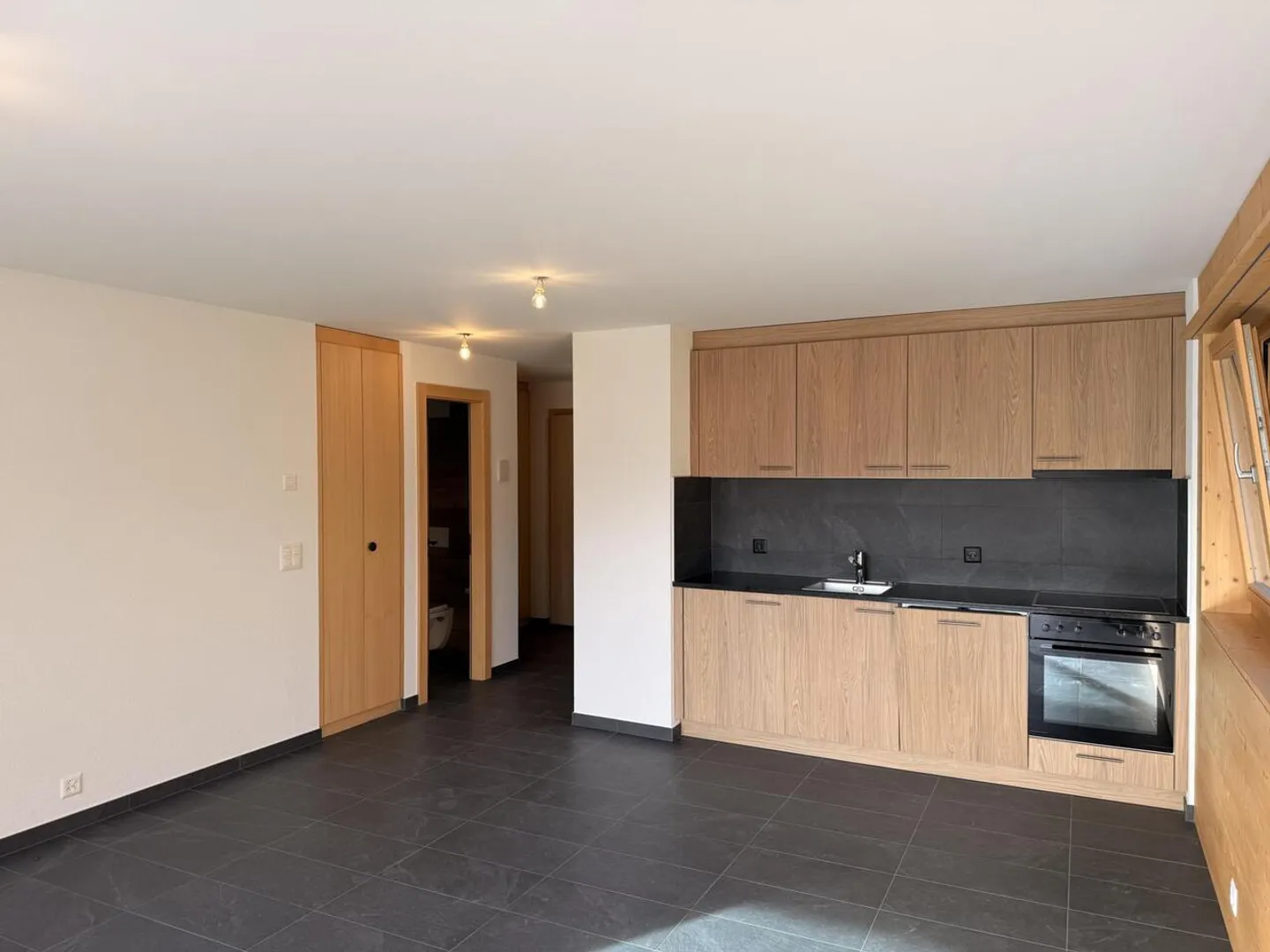 2.5 pièces neuf avec terrasse Sud et vue montagne - Photo 5 of 15