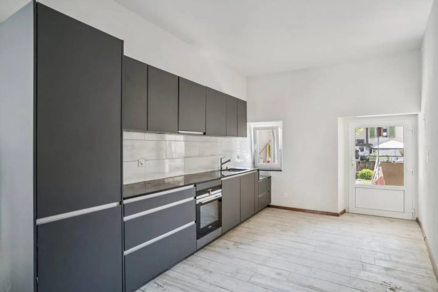 Duplex mit 4,5 Zimmern mit Charakter in einer kleinen WEG - Foto 3 von 11