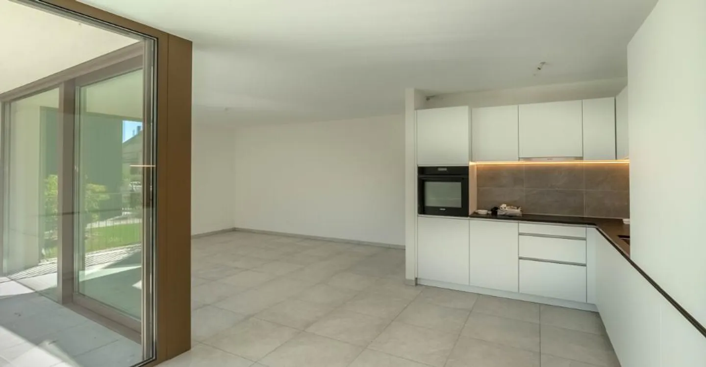 Appartement moderne avec jardin privé - Photo 3 sur 7