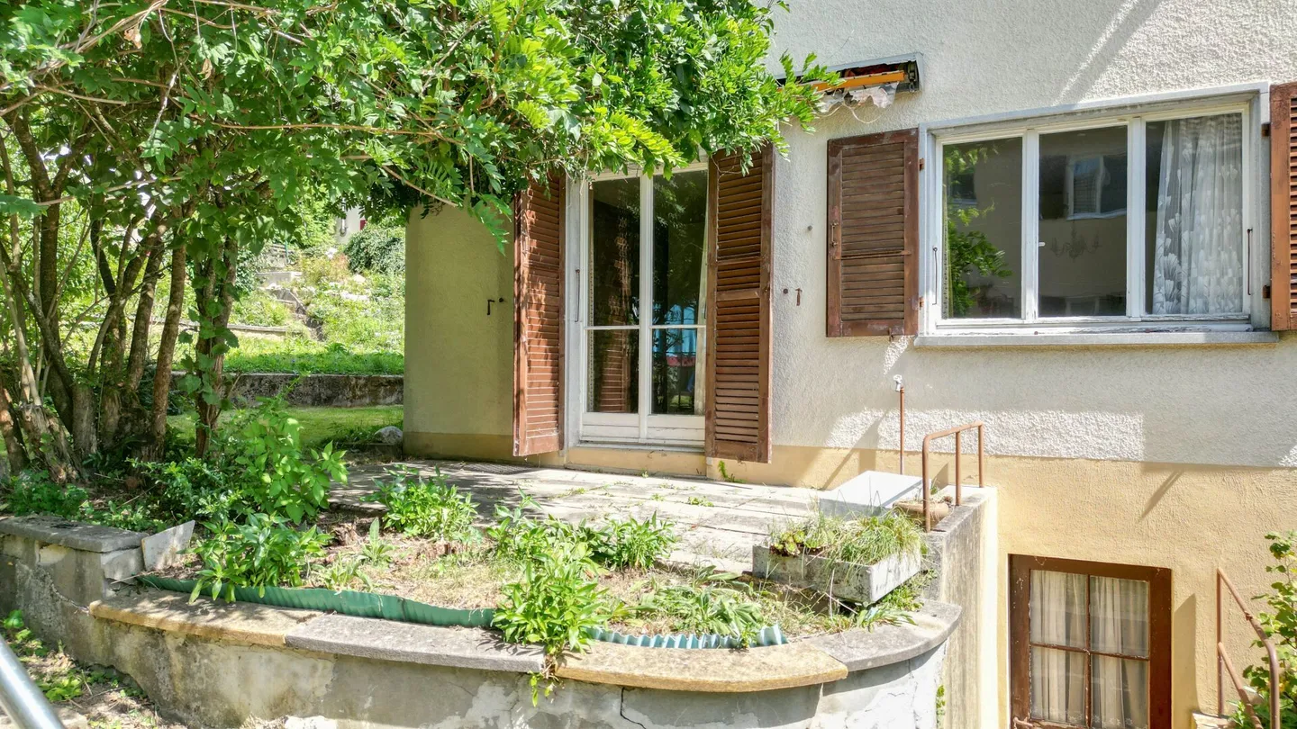 Affascinante casa a schiera con giardino e molto potenziale - Foto 13 di 19