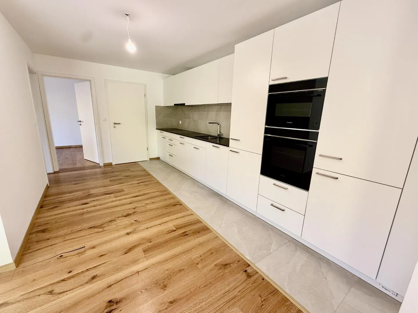 Appartement moderne avec jardin - Photo 2 sur 16