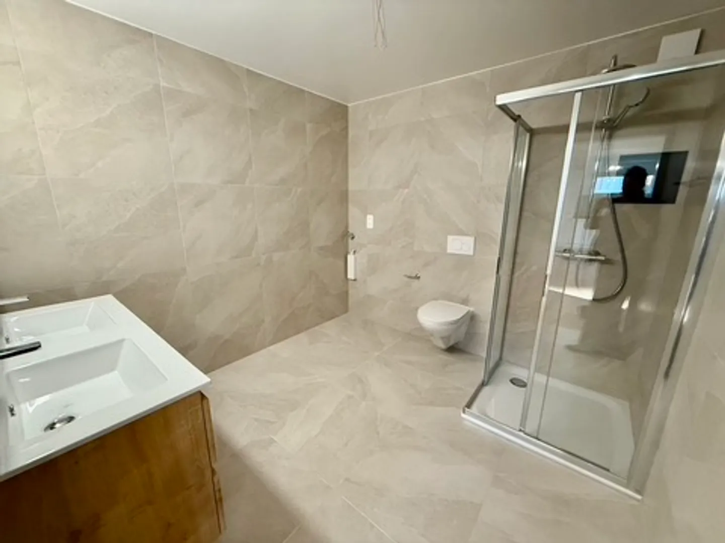 Appartement moderne dans un quartier calme - Photo 4 sur 17