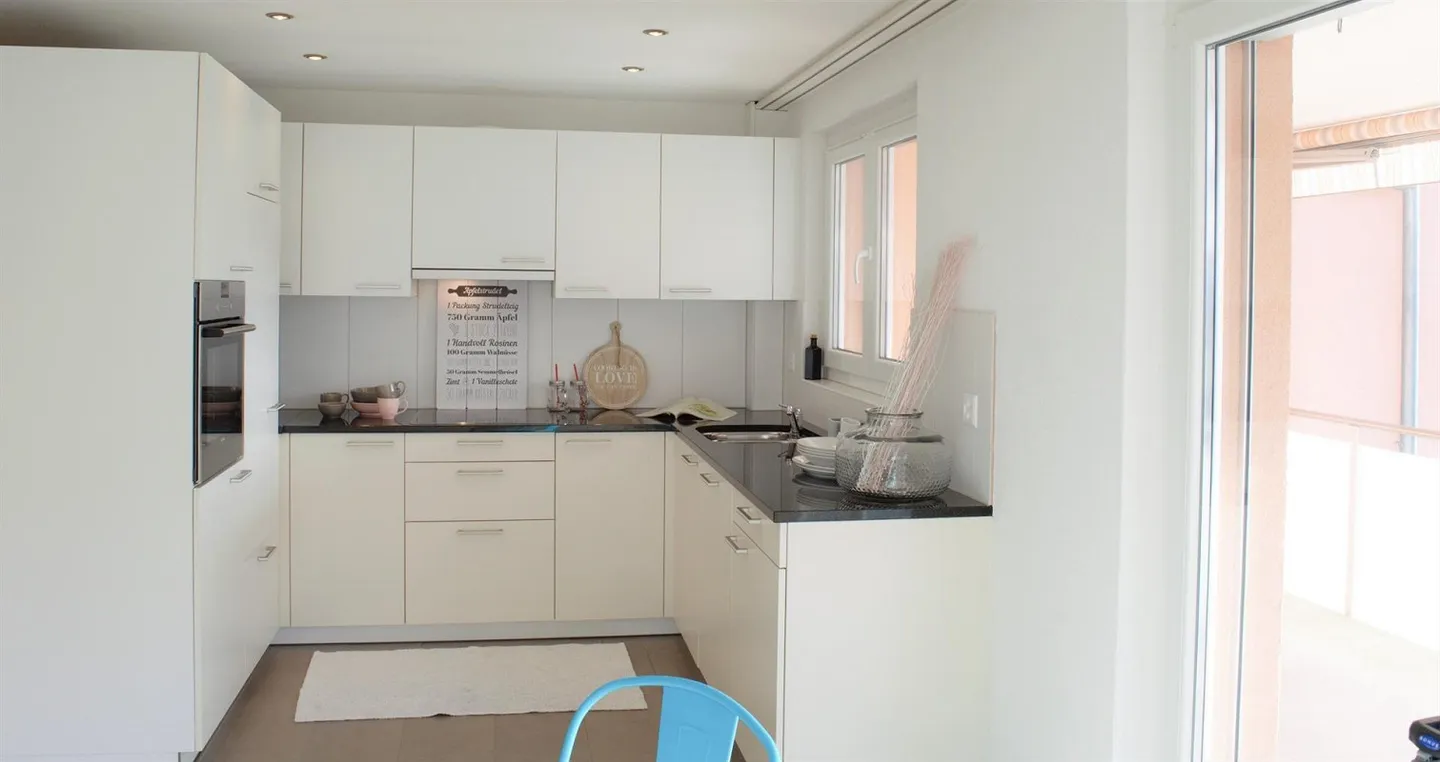 Moderne 2.5-Wohnung mit Balkon - Foto 1 von 6