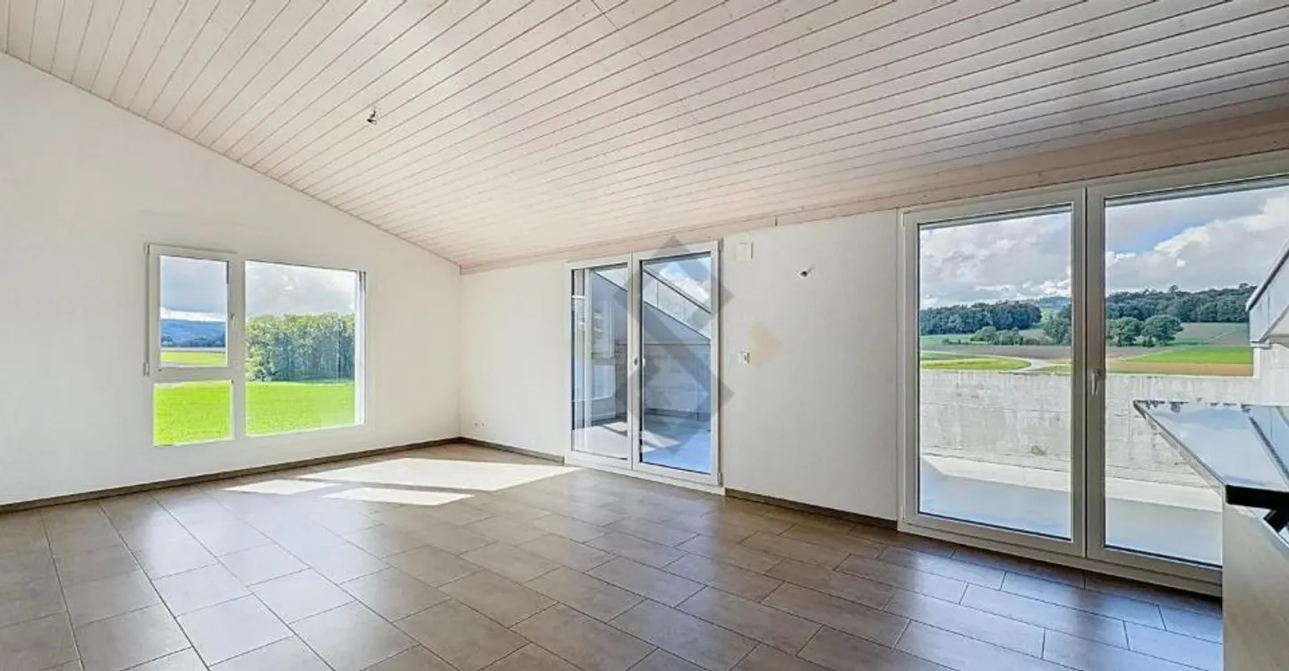 Schöne Dachgeschosswohnung mit 4,5 Zimmern in Fétigny - Foto 2 von 11