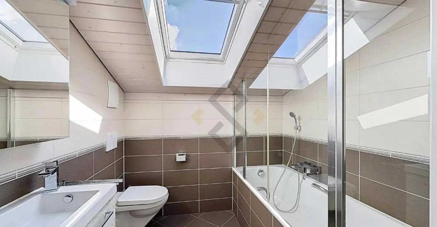 Schöne Dachgeschosswohnung mit 4,5 Zimmern in Fétigny - Foto 6 von 11