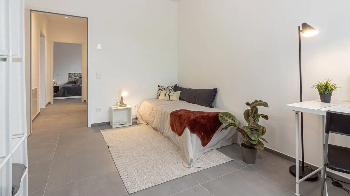 Moderne und ruhige Räume - 3.5 Zimmer in einer exklusiven Residenz am Stadtrand   | Spazi Moderni e Sereni - 3.5 Locali in Residenza Esclusiva ai Confini della Città - Foto 13 von 13