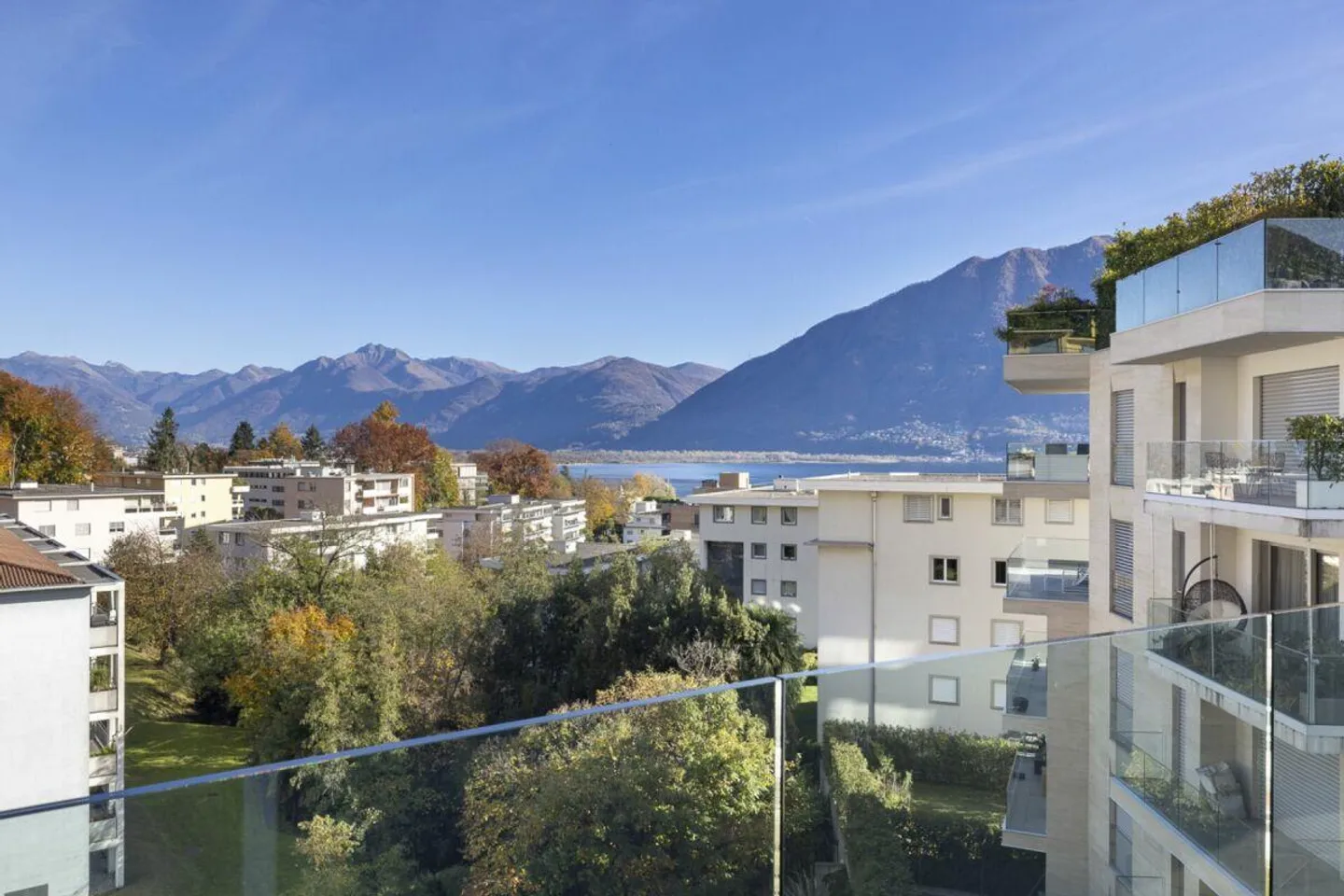 MINUSIO - Elegant Penthouse with Partial Lake View - Photo 1 of 30