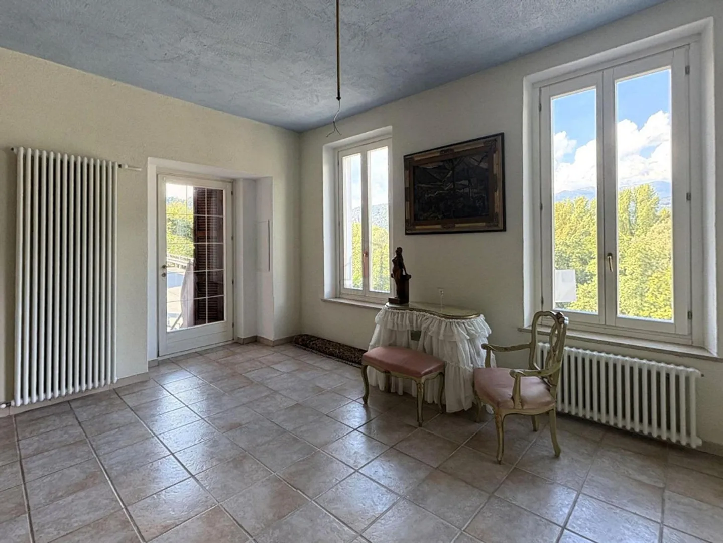 Charming House with Garden and Partial Lake View - Photo 2 of 13