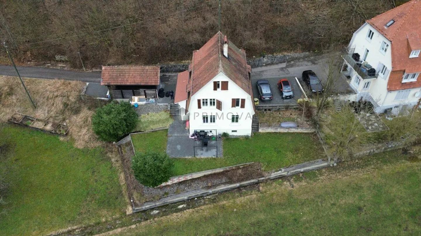 Mehrfamilienhaus mit Garten - Foto 1 von 4