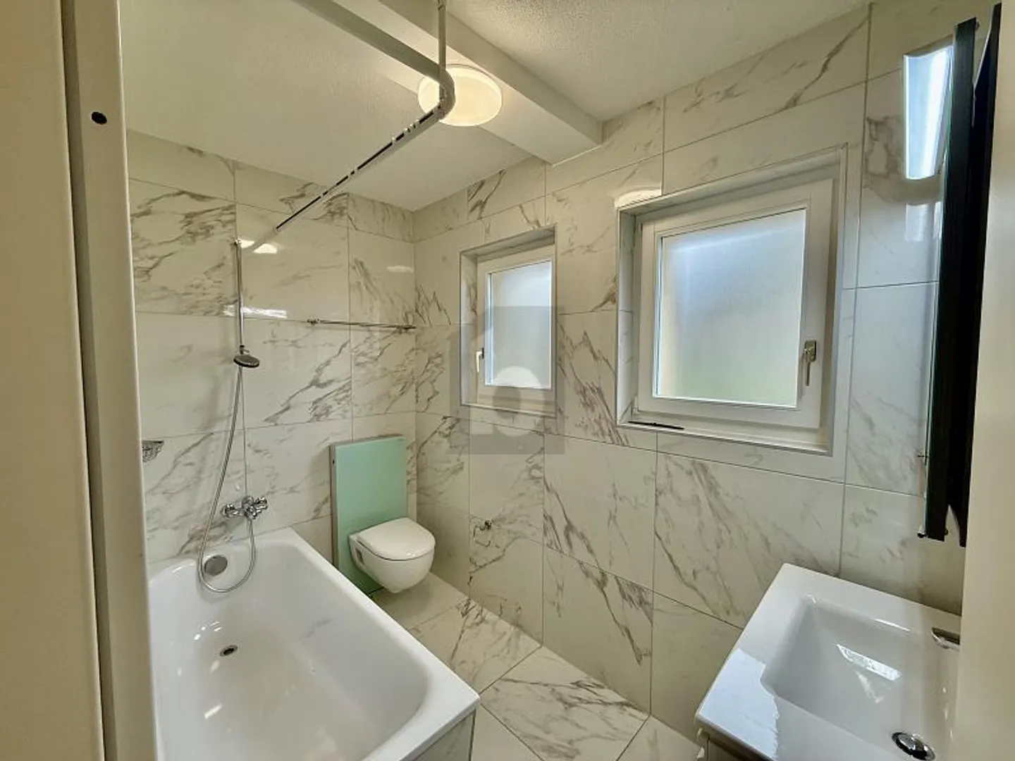 Appartement lumineux avec jardin - Photo 5 sur 6