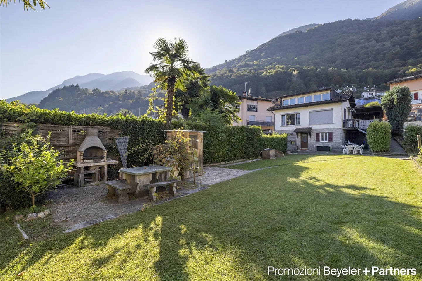 Casa bifamiliare con giardino privato e vista parziale sul lago a Piazzogna - Foto 14 di 15
