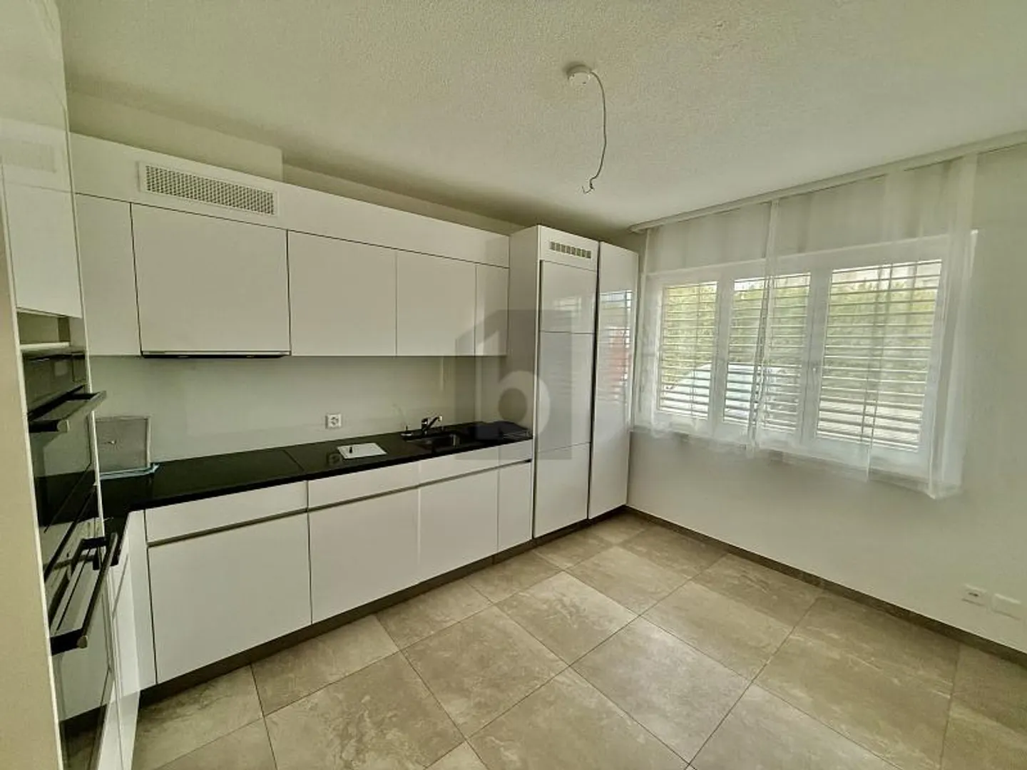 Appartement lumineux avec jardin - Photo 3 sur 6
