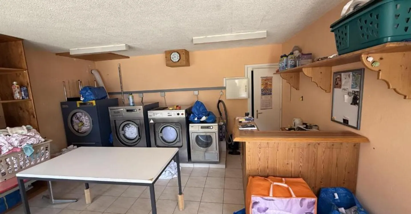 For sale in Tzoumaz a commercial space currently used as a laundry - Photo 2 of 5