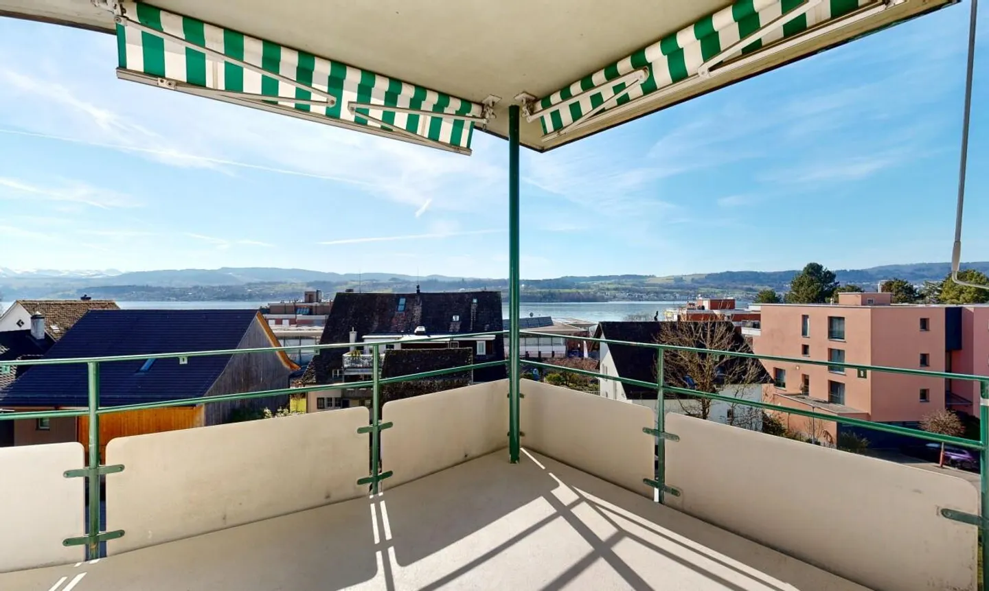 Light-flooded 4-room apartment with lake and mountain views in Meilen - Photo 4 of 11