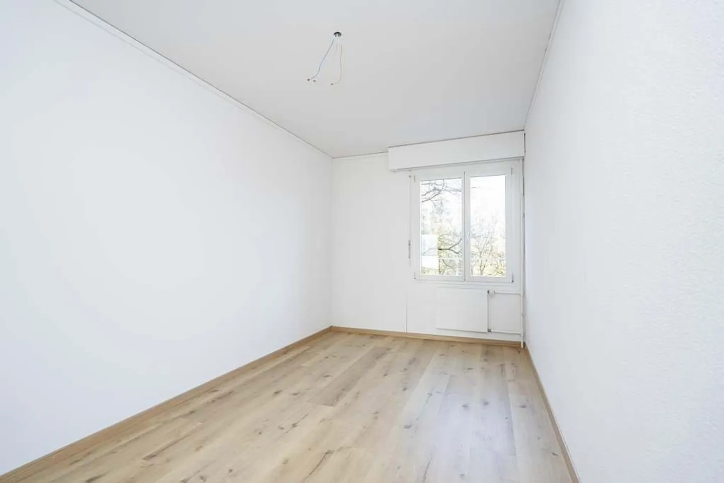 Votre Nouveau Foyer : Appartement de 3.5 Pièces Proche du Centre ! - Photo 5 sur 10