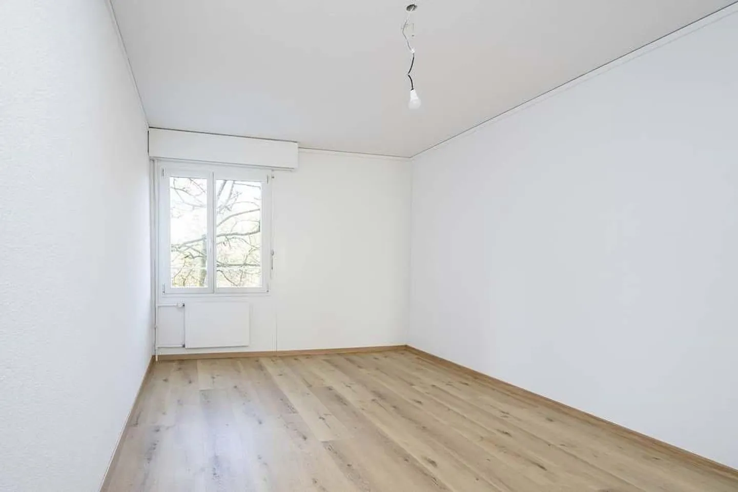 Votre Nouveau Foyer : Appartement de 3.5 Pièces Proche du Centre ! - Photo 6 sur 10