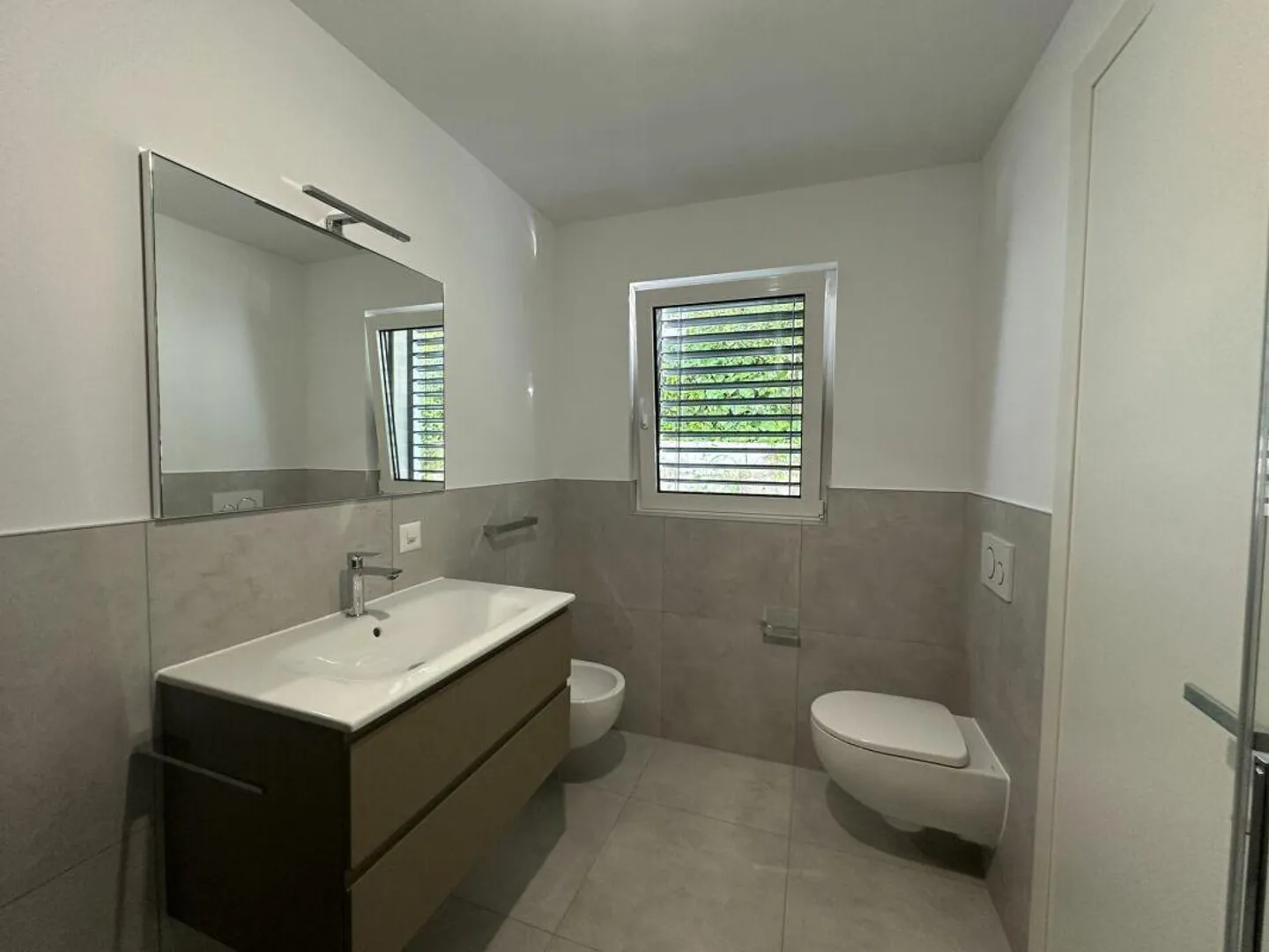 Nuovo e moderno appartamento di 3,5 locali con giardino e terrazza privati a Mendrisio Arzo - Foto 8 di 14