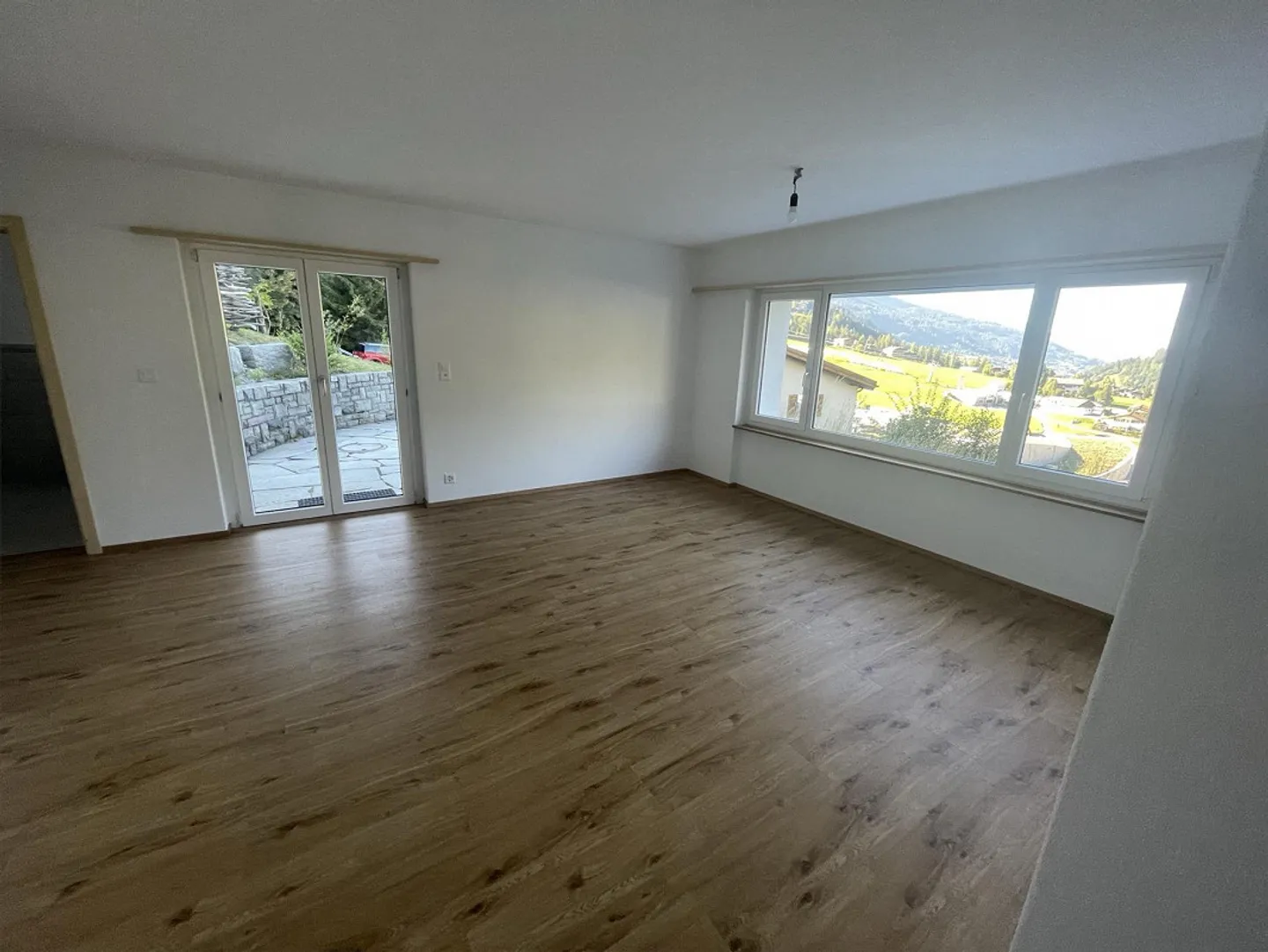 Appartamento attraente con 2½ stanze / appartamento per vacanze a lungo termine con area giardino - Foto 4 di 7