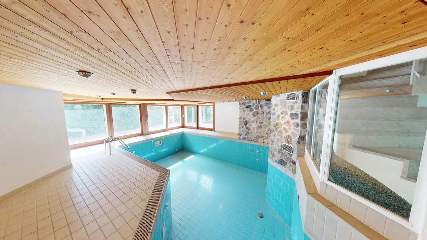 Unique Single-Family Home with Indoor Pool and Spacious Garden - Photo 5 of 5