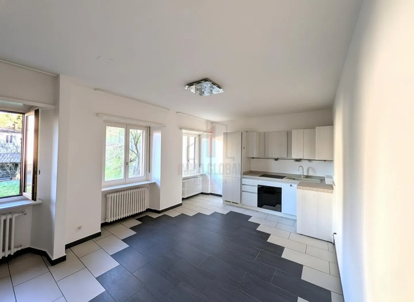 APPARTEMENT CONFORTABLE DANS UN SECTEUR TRANQUILLE - Photo 2 sur 8