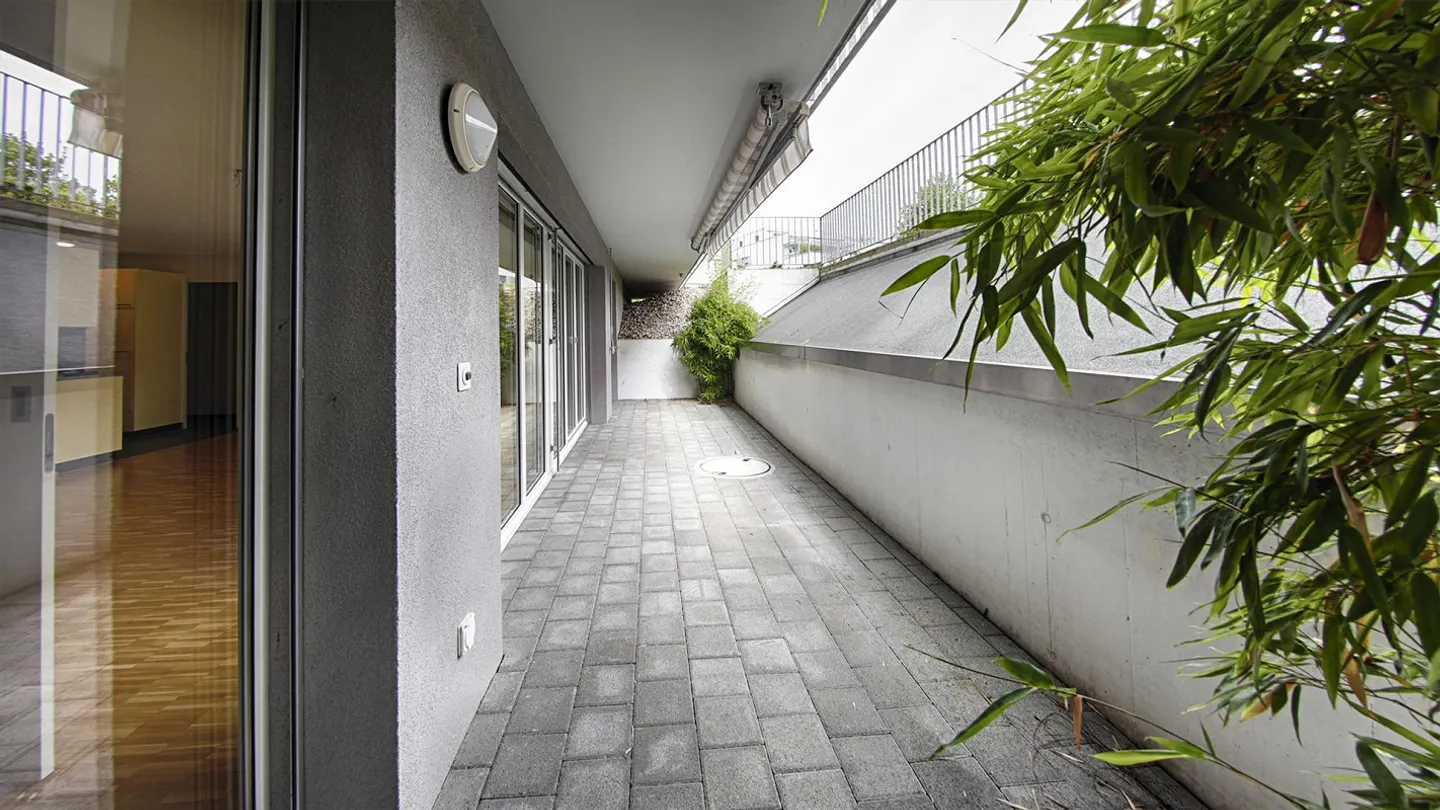Moderne Untergeschosswohnung mit Sitzplatz - Foto 6 von 7