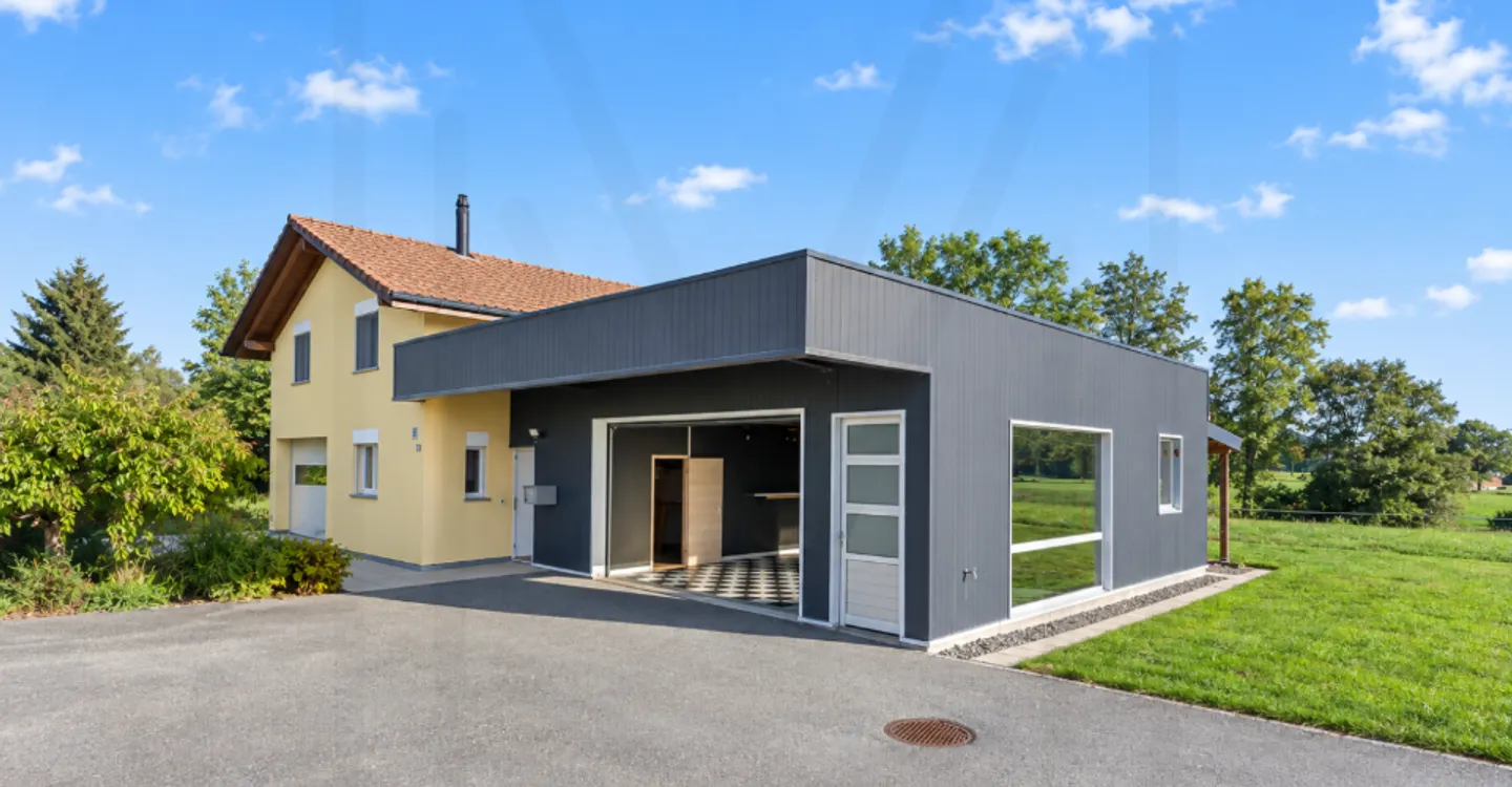 Einfamilienhaus mit Werkstatt-Garage und großem Grundstück - Foto 10 von 11