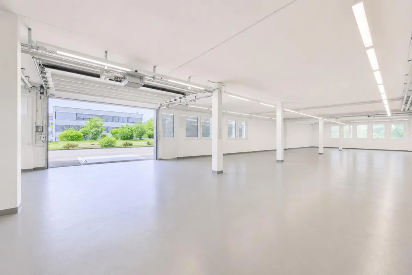 Accessible storage and workshop space with roller door - Photo 2 of 12