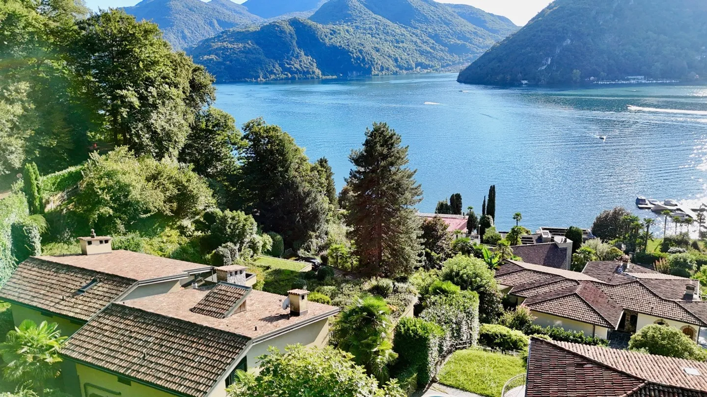 Penthouse Duplex Élégant avec Vue Spectaculaire sur le Lac de Lugano - Photo 7 sur 26