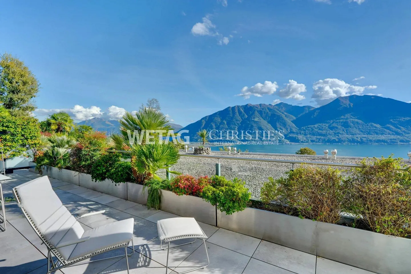 Appartamento moderno e confortevole con terrazza panoramica e vista lago a Mi... - Foto 2 di 13