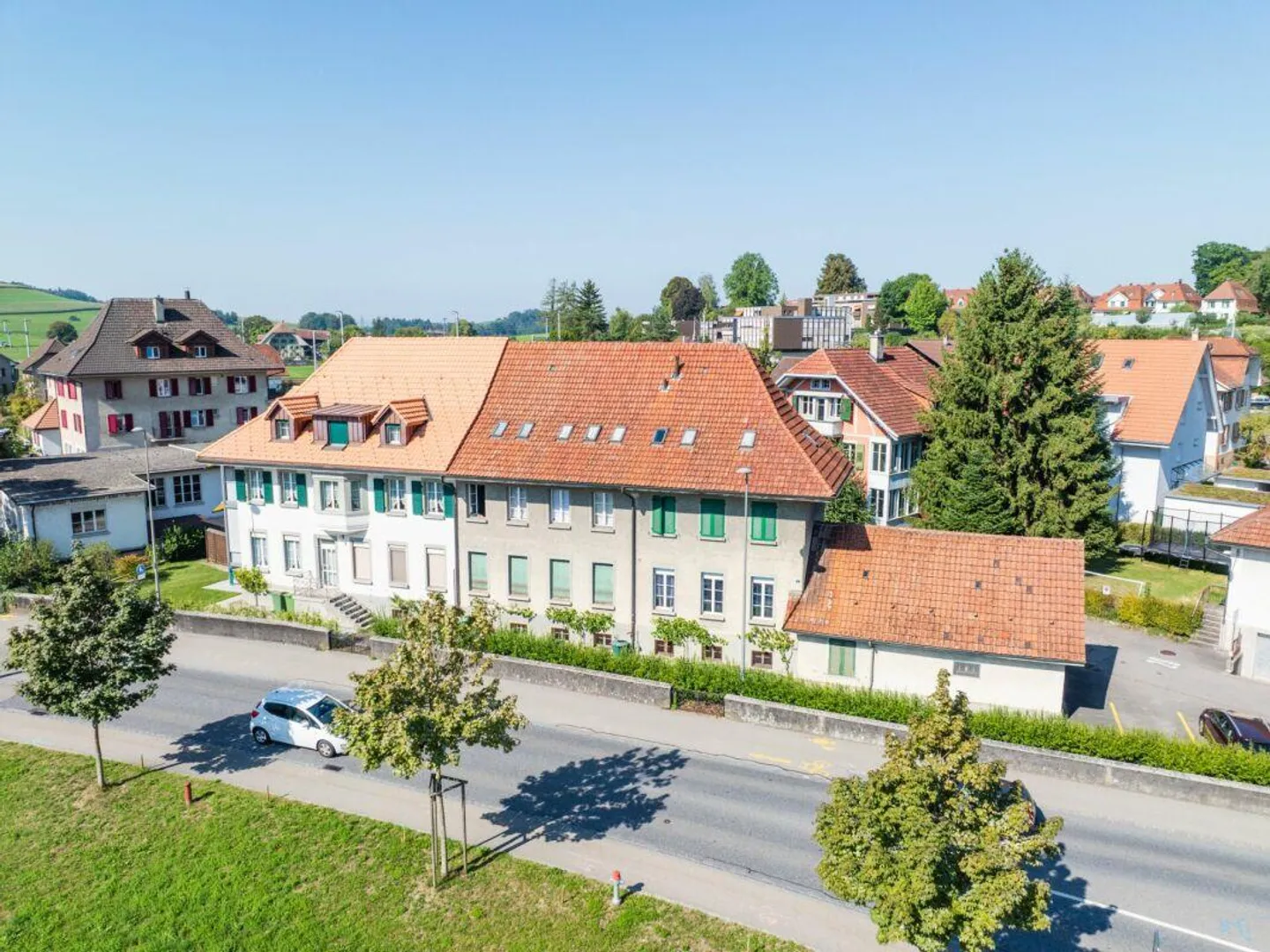 Immeuble multifamilial avec 7 appartements, salles de formation et stationnement - Photo 14 sur 15