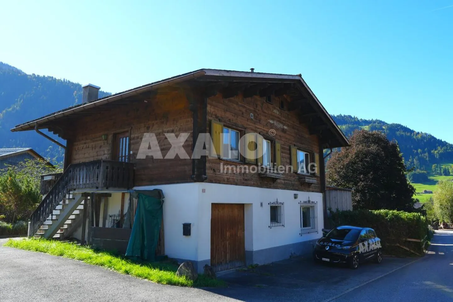 Your Alpine Retreat with Development Potential in Grüsch (GR) - Photo 1 of 16