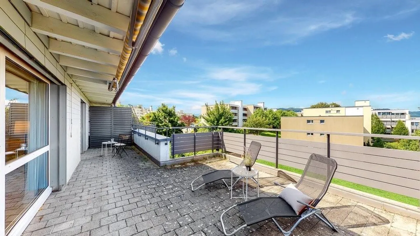 Appartamento attico 3.5 locali con grande terrazza e lavanderia privata - Foto 1 di 11