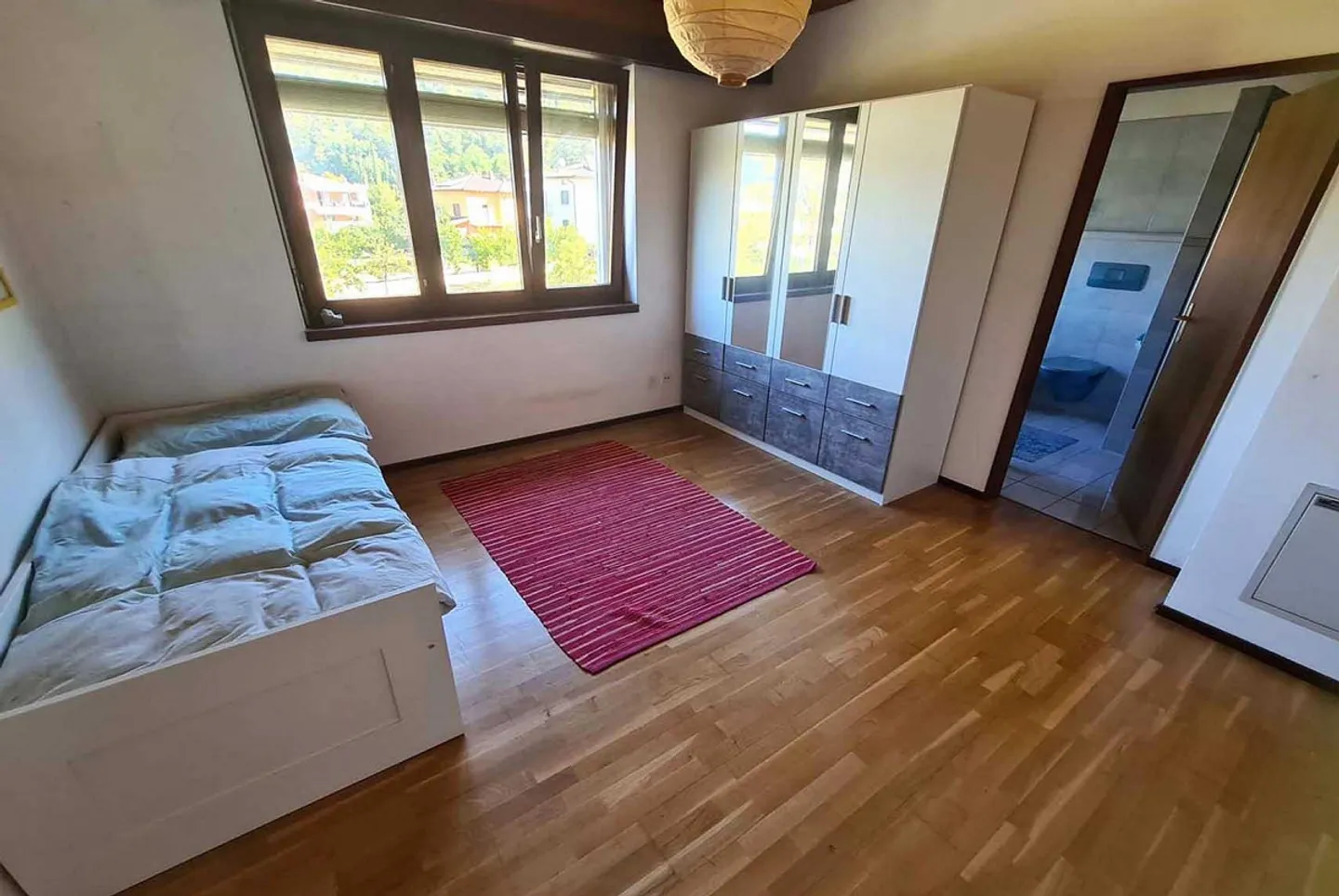 Bella casa bifamiliare di 5,5 stanze nel verde a Melano - Foto 8 di 10