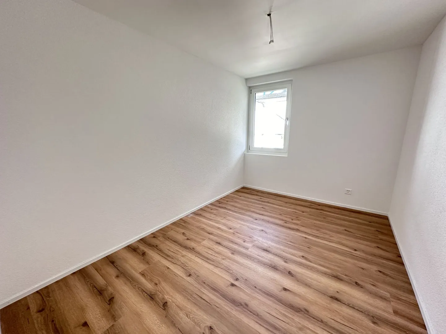 Appartement 4.5 pièces en emplacement central - Photo 5 sur 7