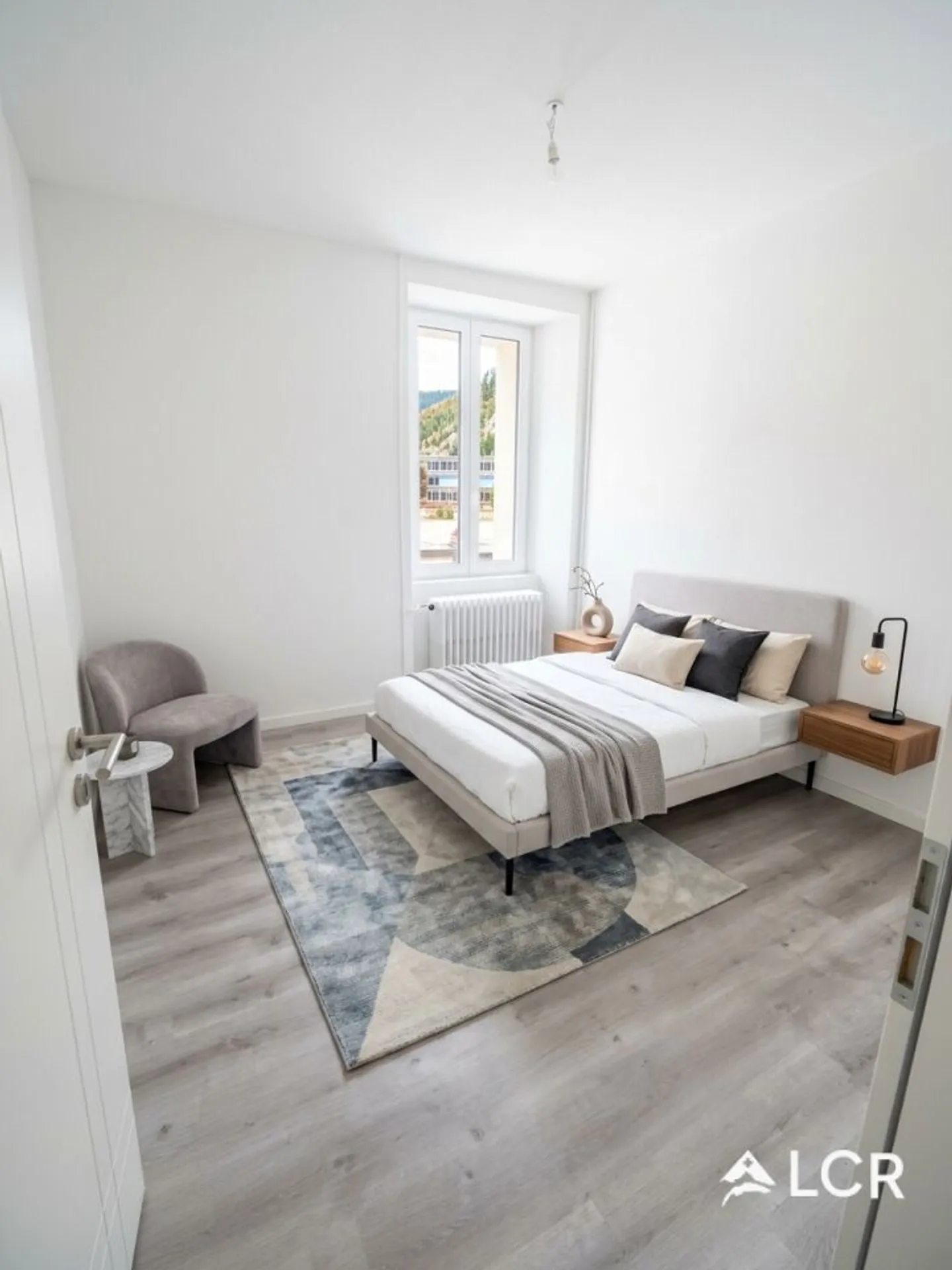 Charmante 4-Zimmer-Wohnung in Fleurier - Foto 3 von 9