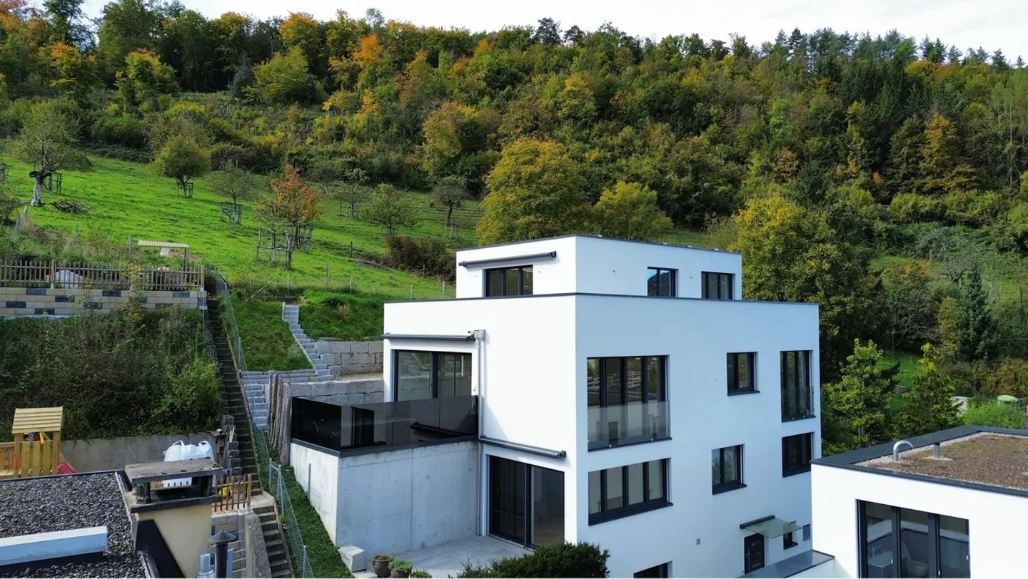 Modern family house with a separate apartment in a quiet location with a view - Photo 1 of 20