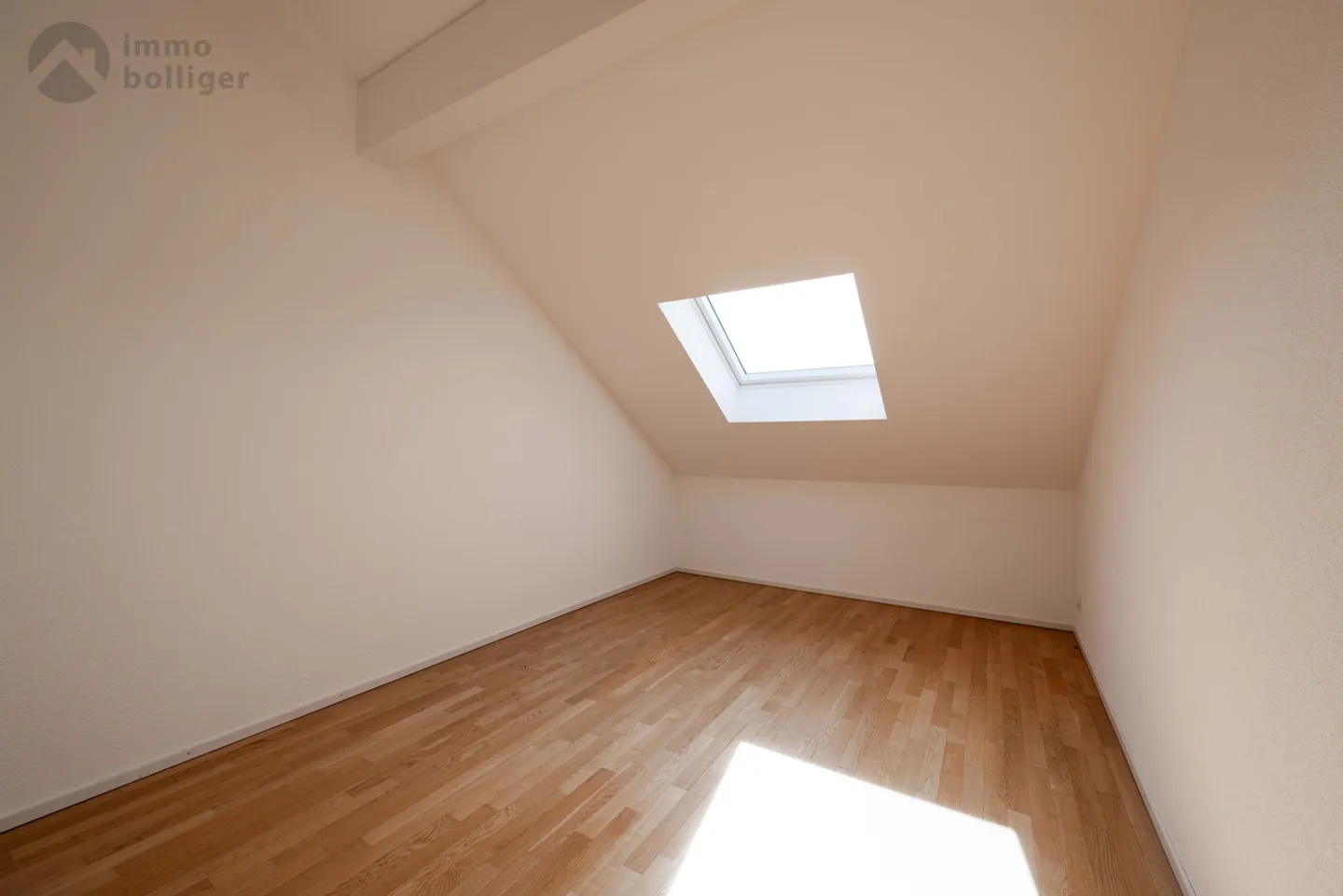 Stylish living above the rooftops – Attic apartment in Reinach - Photo 9 of 13