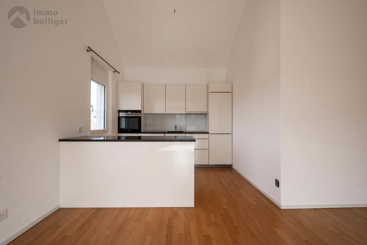 Stylish living above the rooftops – Attic apartment in Reinach - Photo 7 of 13