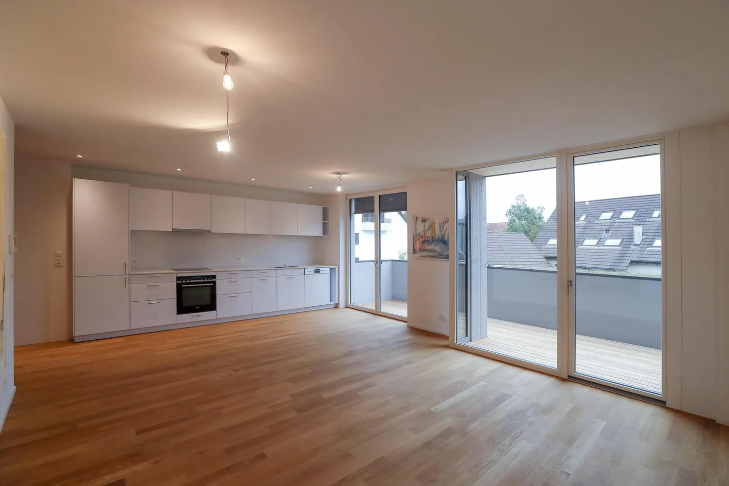 Appartement moderne de 3.5 pièces avec grand balcon - N° 1.6 - Photo 1 sur 9