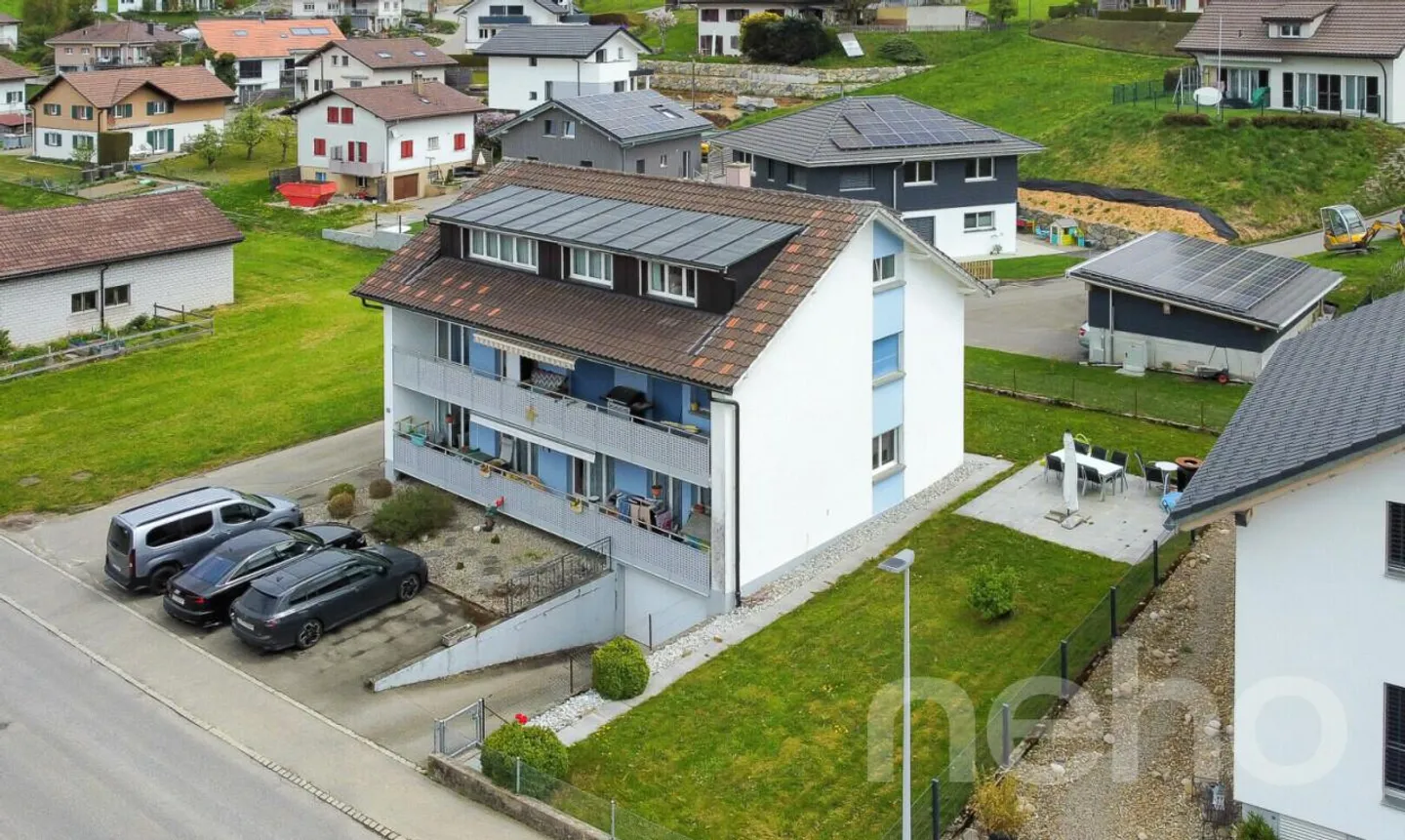 Mehrfamilienhaus in Plasselb - Foto 1 von 11