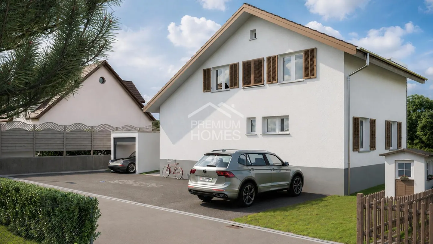 Familienhaus mit grossem Garten - Foto 1 von 7